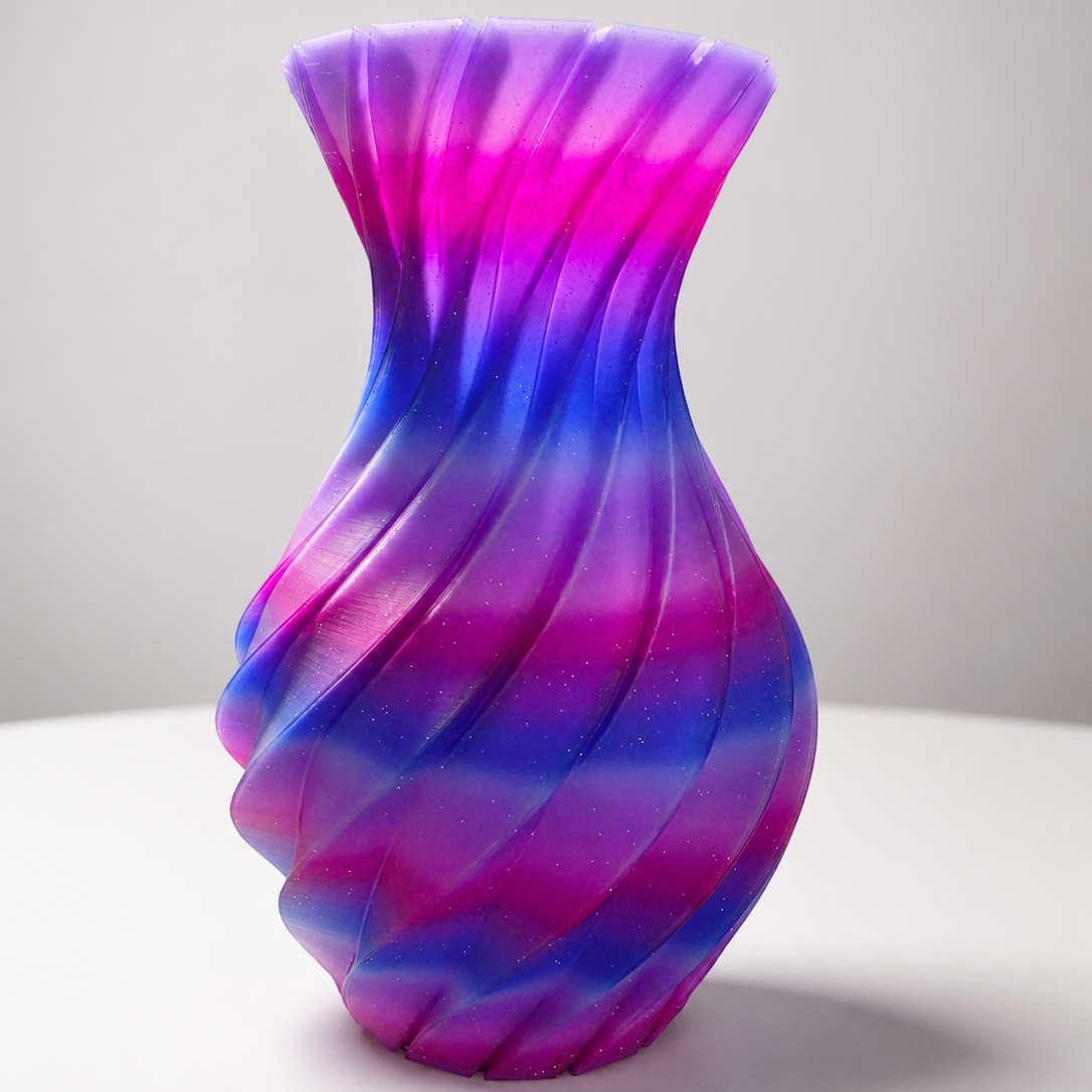 JT-PRINT-SERVICE Nebula 3D printed vase with a spiral ribbed design in glittery lavender, blue, and magenta gradient.