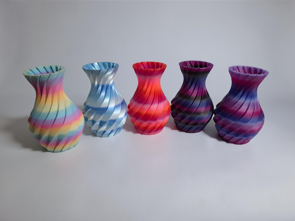 JT-PRINT-SERVICE Twisting Pillars Vases in five unique gradient colorways with spiral ribbed textures.